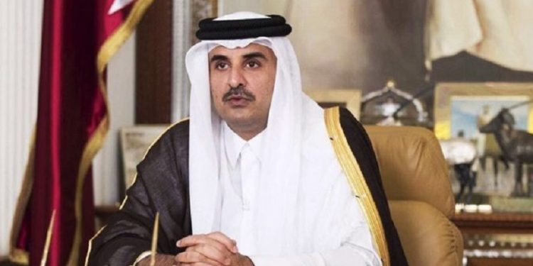 FILE- In this Friday, July21, 2017, file photo, Emir of Qatar Sheikh Tamim bin Hamad Al Thani talks in his first televised speech since the dispute between Qatar and three Gulf countries and Egypt, in Doha, Qatar. Qatar's emir has warned against any military confrontation over the ongoing diplomatic dispute between his country and four other Arab nations, saying it will only engulf the region in chaos. (Qatar News Agency via AP, File)