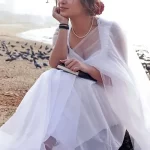 Indian actress Shivangi Joshi looks pretty in a White dress